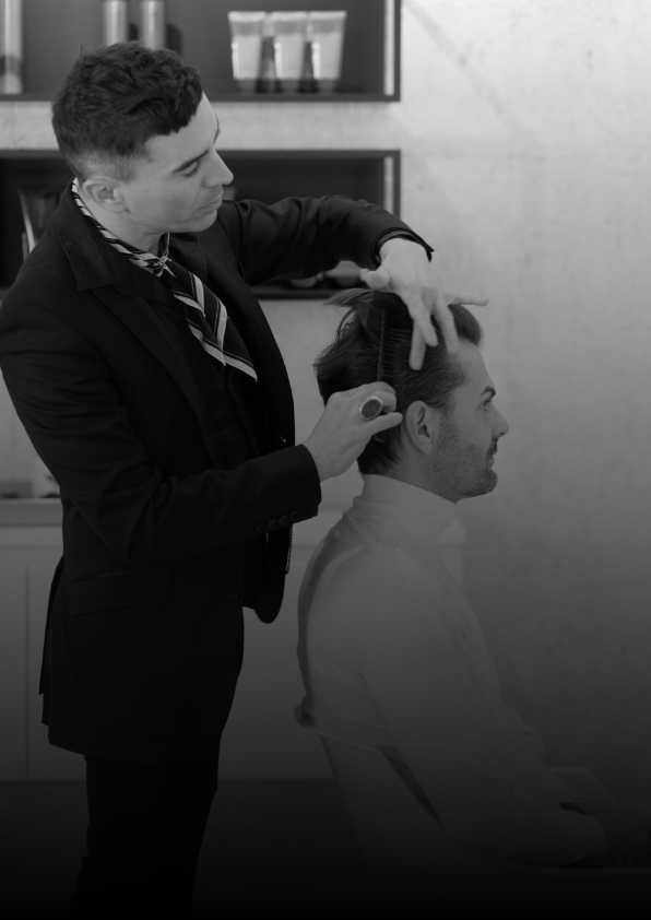 Xavier Scordo cutting hair